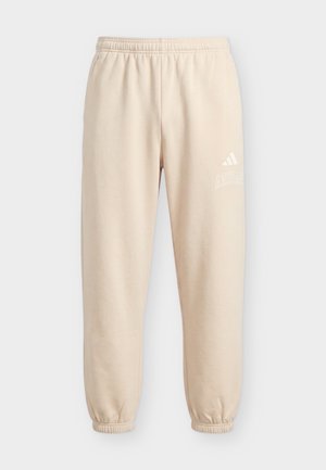 adidas Sportswear, SEASONAL ESSENTIALS COLLEGIATE CUFFED PANTS - Παντελόνι φόρμας - beige/ivory