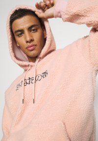 YOURTURN UNISEX - Sweatshirt com capuz - pink