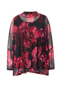Blusa nera trasparente con un grande motivo floreale rosso, collo alto e vestibilità ampia. Presenta maniche lunghe e orlo asimmetrico.