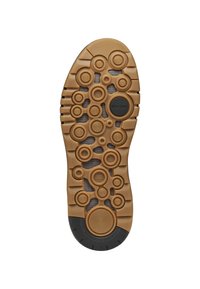 Gummisula med ett mönster av olika cirkuläraDesigner, främst i brunt med svarta accenter. Texturerad för grepp och andningsförmåga.