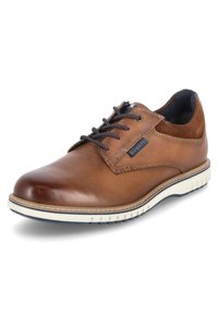 Chaussure en cuir marron à lacets avec un bout rond, semelle en caoutchouc blanche contrastante et lacets bleu accentués. Présente un panneau en daim au niveau du talon.
