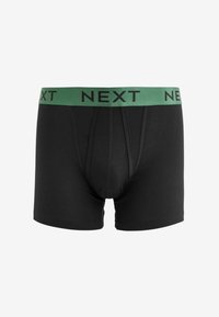 Fekete boxeralsó zöld rugalmas derékkal, rajta a "NEXT" szó fekete betűkkel. Simább anyag, testhezálló dizájn.