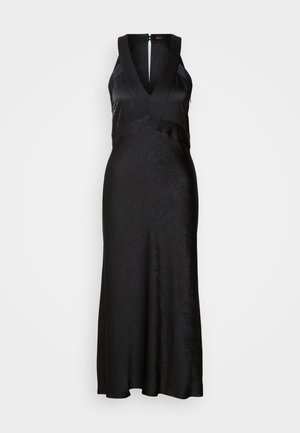 Vestido preto com decote em V, design sem mangas, apresentando um acabamento texturizado e saia rodada. Fecho nas costas com zíper. Tecido liso.