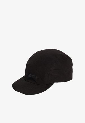 Black cap with a rounded crown, wide brim, and a matte texture. Features "TERREX" logo in dark lettering on the front.