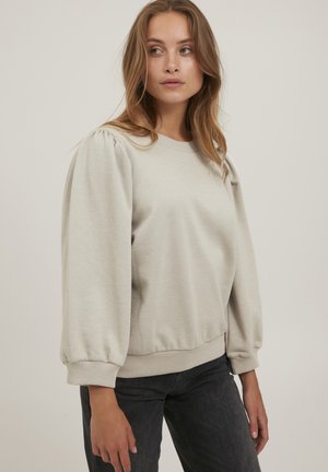 Ljusgrå sweatshirt med puffärmar och ribbad nederkant. Mjukt tyg med en slät textur, med rundad halsringning och avslappnad passform.