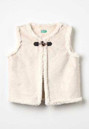 Cremefarvet faux fur vest med rund hals, åben front og mørkebrun toggle-lukning. Har blød tekstur og pelskantede kanter.