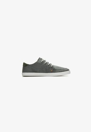 Casual low-top sneaker with gray fabric upper, white laces, olive green heel tab, and white rubber sole, side view on white background.
