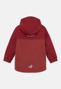 Red hooded jacket featuring a textured upper and smooth lower panel, elastic cuffs, and a reflective logo near the hem.