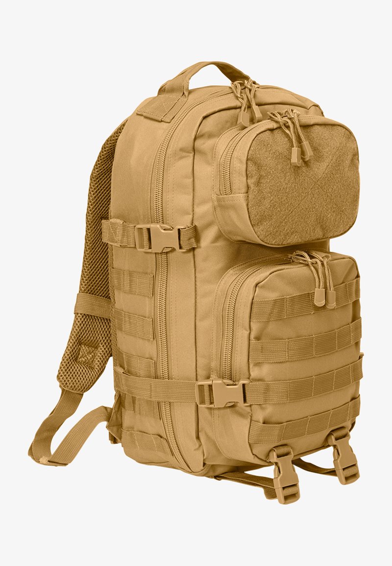 Tökéletes színű, bézs taktikai hátizsák, két cipzáras rekesszel, állítható pántokkal, és MOLLE rendszerű hevederekkel az elülső részen, amelyek lehetővé teszik táskák vagy kiegészítők hozzáadását.