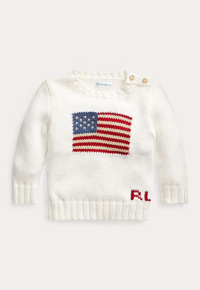 Pull bébé blanc en maille avec motif du drapeau américain sur le devant et deux boutons sur l'épaule gauche.