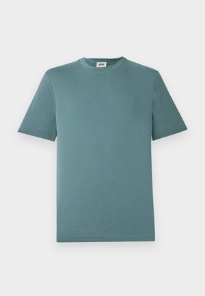 Blue-green short-sleeve crew neck T-shirt with a DRYKORN label inside the collar, displayed flat on a white background.