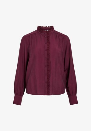 Bordowa bluzka z długimi rękawami, z falbankowym koronkowym kołnierzykiem, zapięciem na guziki z przodu oraz subtelną teksturą na całej tkaninie.