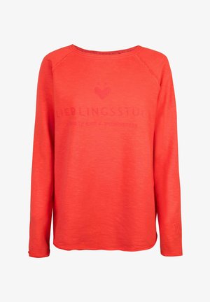 Langarm-Sweatshirt mit Rundhalsausschnitt in leuchtendem Korallrot, mit strukturiertem Stoff und einem dezenten Herz-Logo, darunter steht "LIEBLINGSSSTÜCK".
