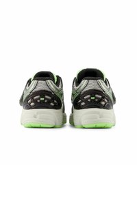Black and gray running shoes with green accents, featuring a textured upper mesh and patterned heel support. Thick cushioned sole.