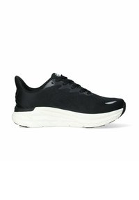 Scarpe sportive nere con parte superiore in rete testurizzata, design con lacci e intersuola bianca imbottita. Branding minimalista sulla linguetta.