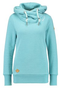 Turkos sweatshirt med funnel-neck, dragsko, ribbade muddar och fåll. Har en diskret logotyp på bröstet och en dekorativ badge på ärmen.