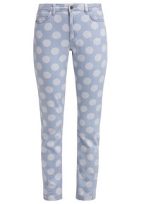 Ljust blå denimjeans med stora vita prickar. Slim fit-design med traditionell femficksstil och knappstängning fram.