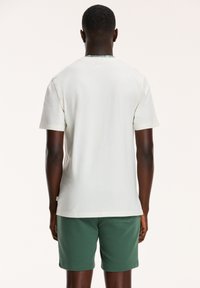 Shiwi Triko s potiskem - jet white