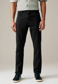 Next SUMMERWEIGHT COTTON - Jeans Tapered Fit - black