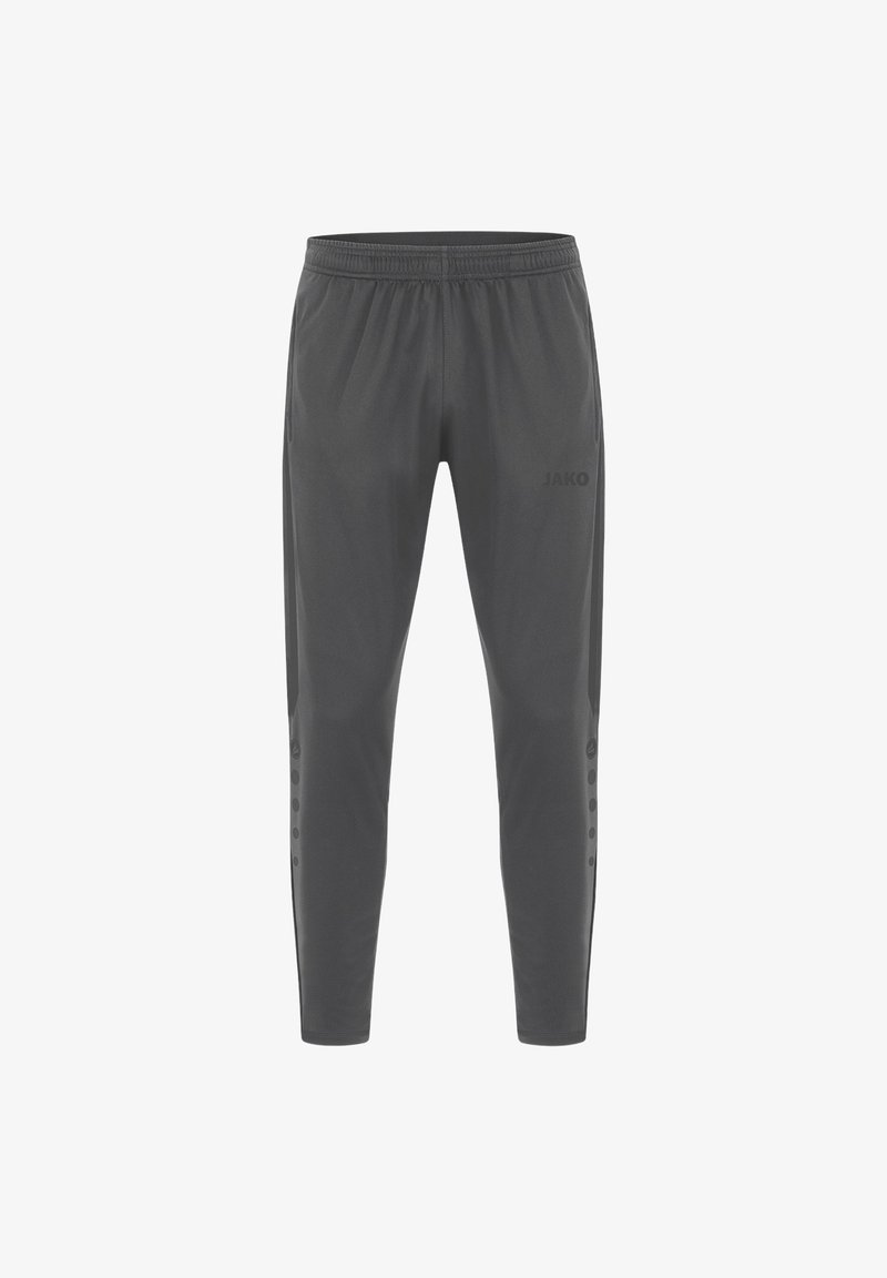 Graue Sporthose mit elastischem Bund, taillierter Passform, strukturiertem Stoff und seitlichen Details mit kleinen runden Akzenten. JAKO-Logo vorhanden.