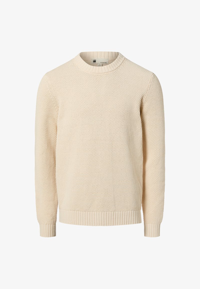 Kremowy sweter o teksturowanym wzorze dzianiny, z okrągłym dekoltem oraz ściągaczami na mankietach i dole. Wykonany z miękkiego, przepuszczającego powietrze materiału.