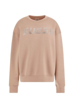 Pink sweatshirt featuring a crew neck and relaxed fit, with a rhinestone "GUESS" logo across the chest. Material is soft and smooth.