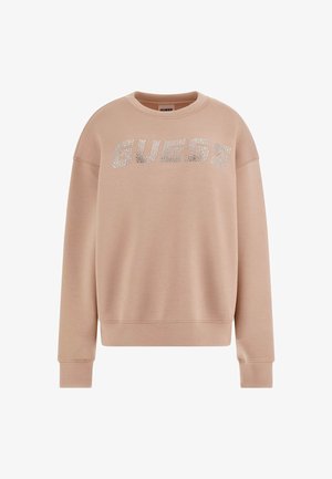 Pink sweatshirt featuring a crew neck and relaxed fit, with a rhinestone "GUESS" logo across the chest. Material is soft and smooth.