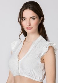 White cropped blouse with ruffled sleeves, floral embroidery, and button closure. Features a delicate lace trim along the neckline.
