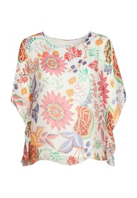 Blusa blanca holgada con mangas anchas que presenta un colorido patrón floral en tonos de rosa, naranja, azul y verde.