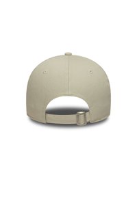 Beige baseball cap with a smooth fabric finish, curved brim, and adjustable strap at the back featuring a metal clasp.