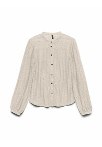 Ljusbeige blus med långa ärmar, rund halsringning och knäppning. Det strukturerade tyget har blommönster och svarta knappar.