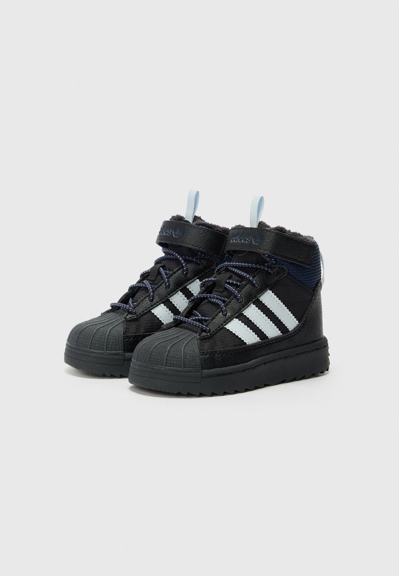 adidas Originals SUPERSTAR TREK UNISEX - Winter boots - core black/halo  blue/carbon/anthracite - Zalando.co.uk
