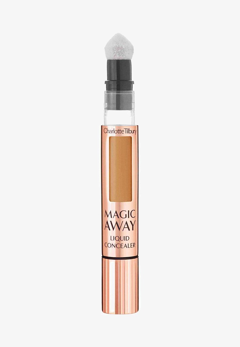 Liquid concealer in a clear plastic tube with a rose gold cap. Features a pointed, white applicator tip and a medium tan shade visible inside.