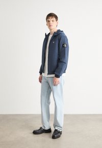 Calvin Klein Jeans PADDED HOODED HARRINGTON - Lahka jakna - ink