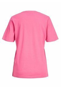 Rosa bomulls t-skjorte med løs passform, korte ermer og rund halslinje, med en glatt tekstur og uten synlige mønstre eller detaljer.