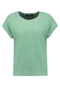 Camiseta de malla verde menta con cuello redondo, mangas cortas y un ajuste holgado. Tejido texturizado con pequeños agujeros para mayor transpirabilidad.