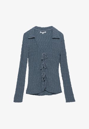 Geribbelde cardigan met lange mouwen in zachte, gestructureerde blauwe stof, met een kraag en een sluiting met een strik aan de voorkant, voorzien van lussen.