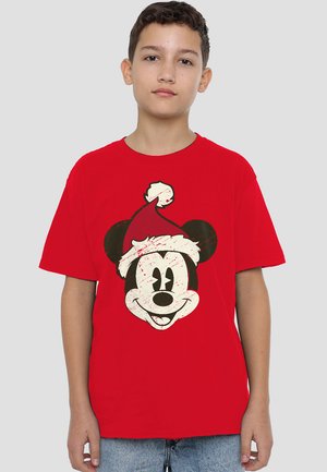 Red t-shirt featuring a graphic of Mickey Mouse wearing a Santa hat. The design includes a distressed finish and bold black outlines.