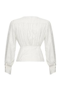 Witte blouse met een gestructureerd patroon, opstaande lange mouwen, geplooide details op de rug en knoopmanchetten. Tailored fit accentueert de taille.