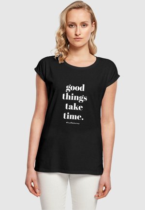 Merchcode GOOD THINGS TAKE TIME  - Printtipaita - black