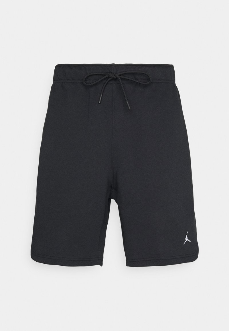 Shorts de sport noirs avec taille à cordon et petit logo Jumpman blanc sur la jambe gauche, sur un fond uni.