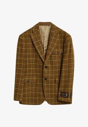 Herenblazer van bruin en oranje plaids wol met notch-lapels, twee zwarte knopen, drie klepzakken en een labelpatch op de mouw.