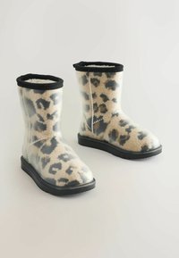Skaidrios lietaus batai su leopardų raštu, juodais guminiais padais ir juodu audinio apvadu viršuje. Viduje iškloti minkšta, pūkuota medžiaga.