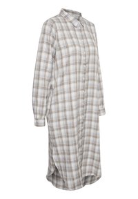 Robe à carreaux bleu clair, beige et marron, avec un col, des manches longues et un ourlet arrondi en bas.