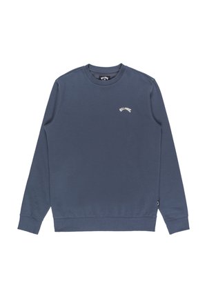 Sudadera azul marino de tela suave, con mangas largas, cuello redondo y un pequeño logo blanco en el pecho.