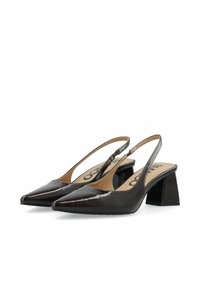 Mustat patenttinaamioiset slingback-korkokengät, joissa on teräväkärkinen muoto ja boksi-korko. Ominaisuuksiin kuuluu matala leikkaus avoimella takana ja brändätty sisäpohja.