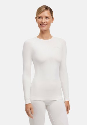 Witte getailleerde blouse met lange mouwen, een gladde textuur en een naadloos ontwerp, met een subtiel logo op de borst en een ronde halslijn.