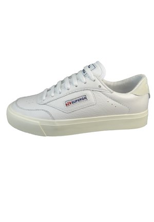 White leather sneakers with a low profile, textured finish, round toe, and lace-up closure. Features a small red and blue logo tag.