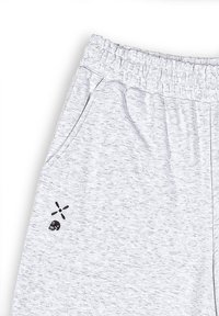 Light gray sweatpants made from textured fabric, featuring an elastic waistband and a black skull logo with a design accent.
