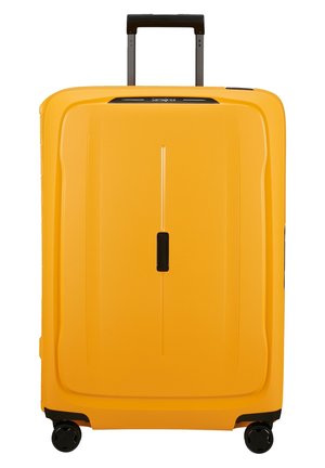 Yellow hard-shell suitcase with a retractable black handle, four wheels, and a smooth texture. Features a slim vertical design and minimal accents.